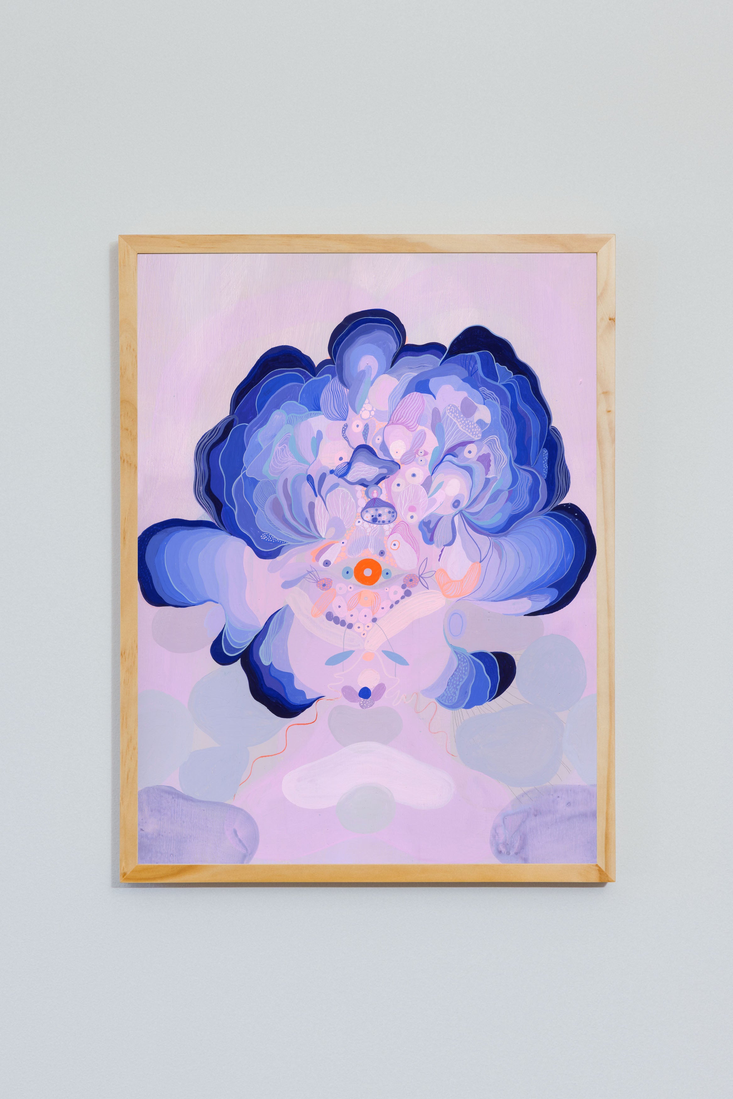 Ultramarine Orb framed in a light wood frame, contemporary abstract artwork.